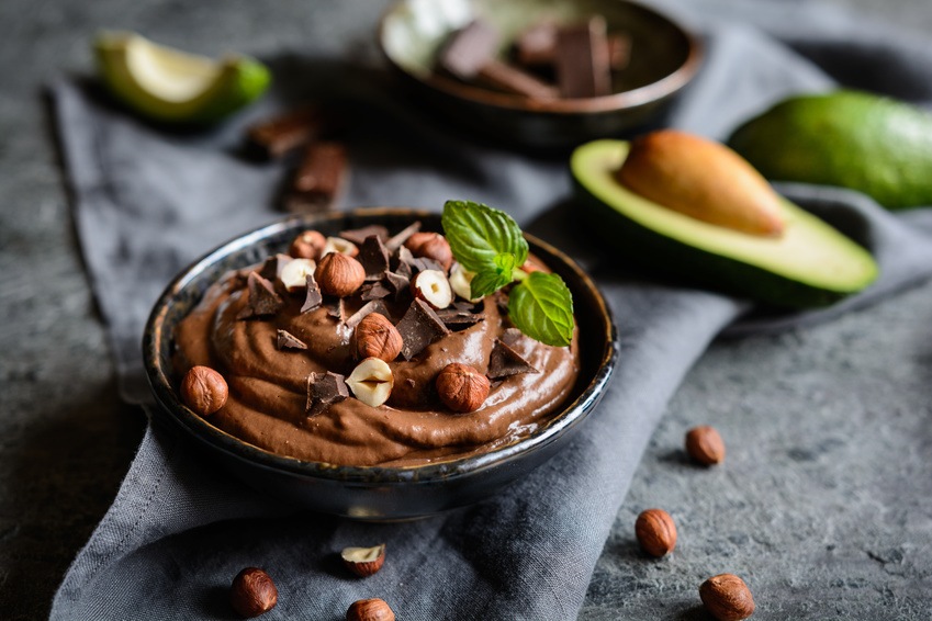 Raw Avocado Chocolate Mousse Topped With Hazelnuts